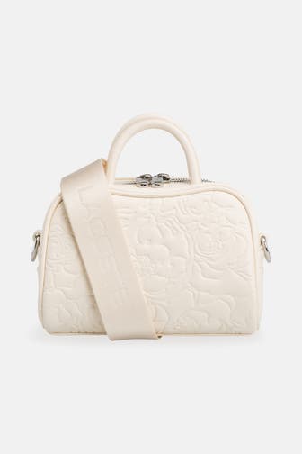 LACOSTE Umhängetasche creme