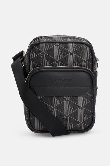 LACOSTE Umhängetasche schwarz gemustert