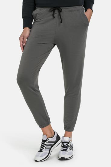 UNDER ARMOUR - Sweatpants steingrau