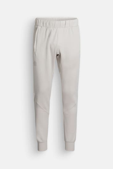 UNDER ARMOUR - Sweatpants creme