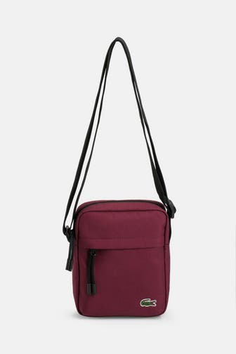LACOSTE Umhängetasche weinrot