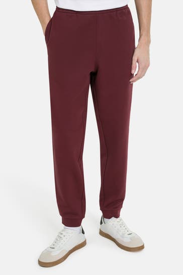 LACOSTE Sweatpants burgunder tapered fit