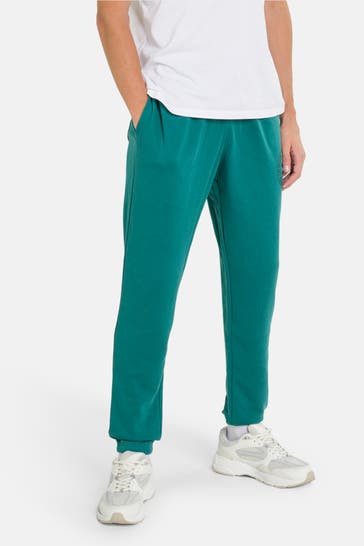 UNDER ARMOUR 'Rival' petrol-coloured Sweatpants