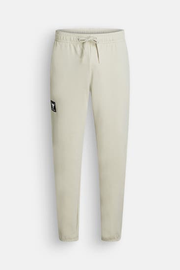 UNDER ARMOUR - Sweatpants lindgrün