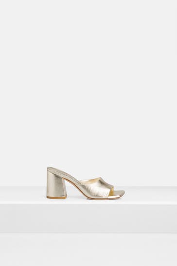 STUART WEITZMAN Mules gold