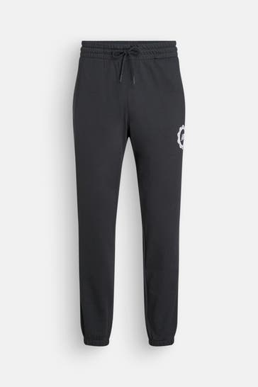 NEW BALANCE Sweatpants schwarz